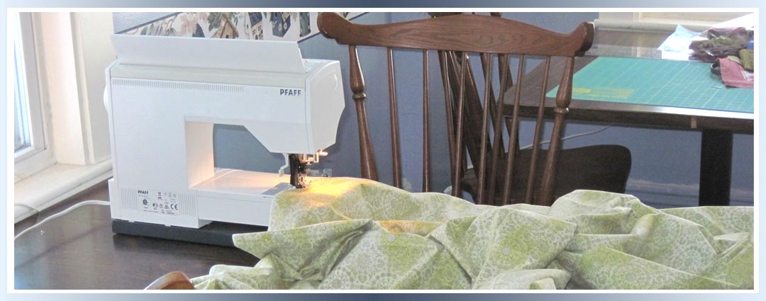 Sewing machine on the table with fabric